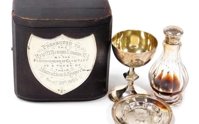 A Victorian silver communion set, comprising a challis engraved...
