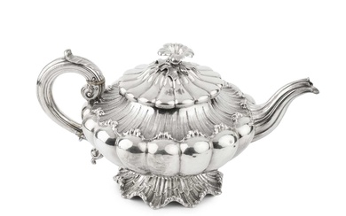 A William IV silver teapot, of lobed and compressed form,...