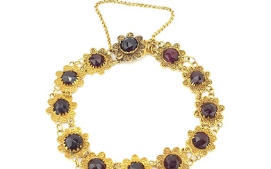 A beautiful antique 14 carat gold boat link bracelet, consisting...