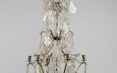 A brass chandelier, glass prisms, 20th century.