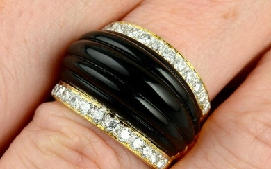 A carved onyx and diamond dress ring. Estimated total