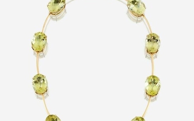 A citrine and eighteen karat gold necklace