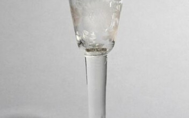 A cordial glass c.1740-50, the small rounded funnel...