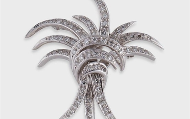 A diamond and platinum brooch designed as a dimensional...