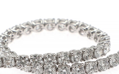 A diamond bracelet set with numerous brilliant-cut diamonds weighing a total of app. 6.44 ct., mounted in 18k white gold. D-F/IF-VVS. Triple excellent cut.