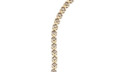 A diamond line bracelet, composed of a series of claw-set brilliant-cut diamond links with cross design connections, length 18.5g