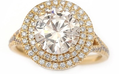 A diamond ring set with a brilliant-cut light brown diamond weighing app....