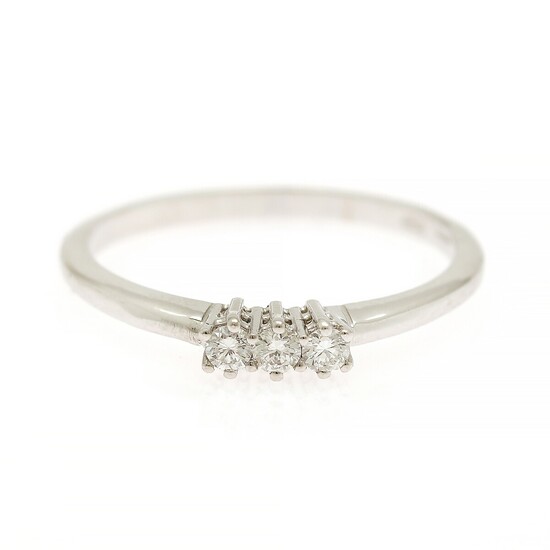 A diamond ring set with three brilliant-cut diamonds, mounted in 18k white gold. Size 54.