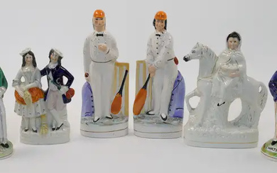 A group of Staffordshire ceramic figures, 19th century, comprising: two double-faced "Gin"...