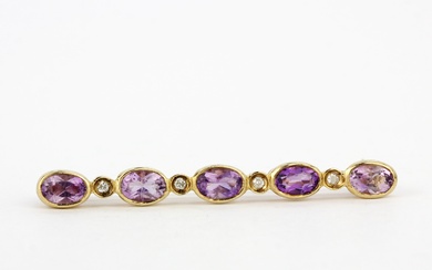 A hallmarked 9ct yellow gold amethyst and diamond brooch, L. 4.5cm.