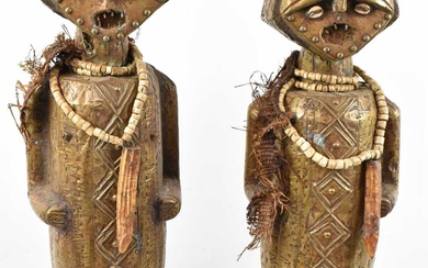 A large pair of Ambété fetish figures, Gabon, brass clad...