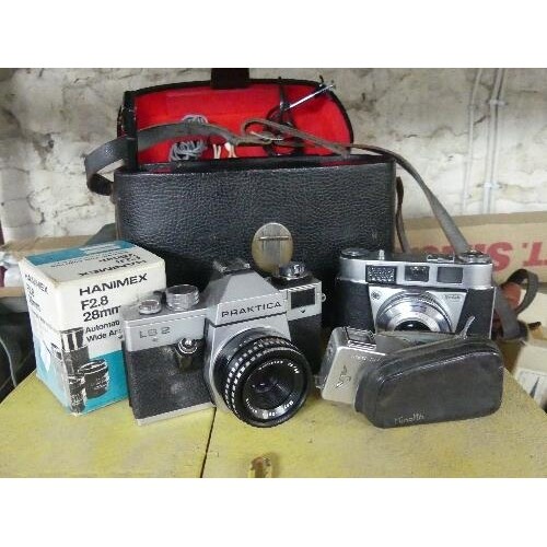 A large quantity of Cameras and Photographic Equipment; comp...