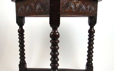 A late 17th century and later oak side table, the...