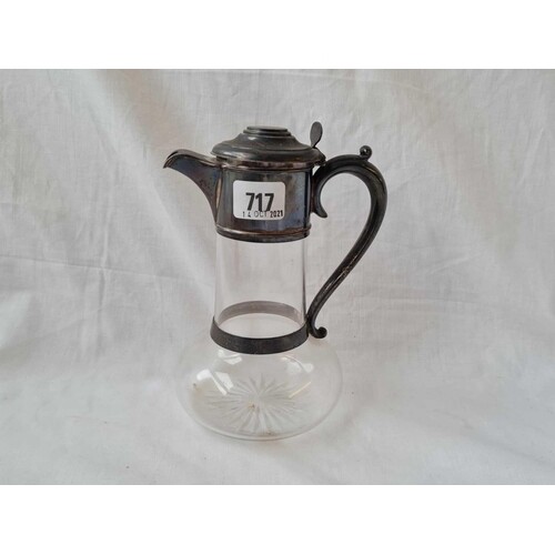 A late Victorian claret jug with silver hinges cover & glass...