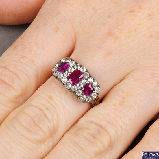 A late Victorian silver and 18ct gold, Burmese ruby and old-cut diamond triple cluster ring.