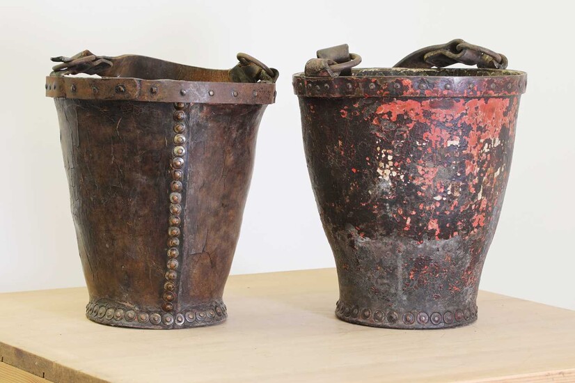 A near pair of leather fire buckets