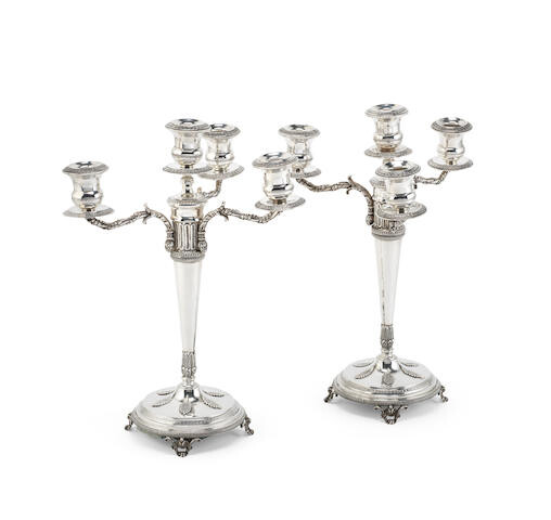 A pair of Greek silver four-light candelabra