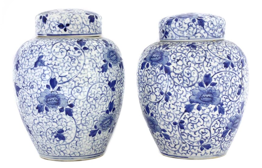 A pair of Japanese blue and white jars and covers