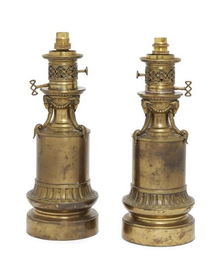 A pair of Victorian brass sinumbra lamps,...