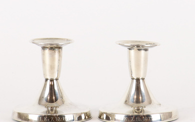 A pair of candlesticks, silver.