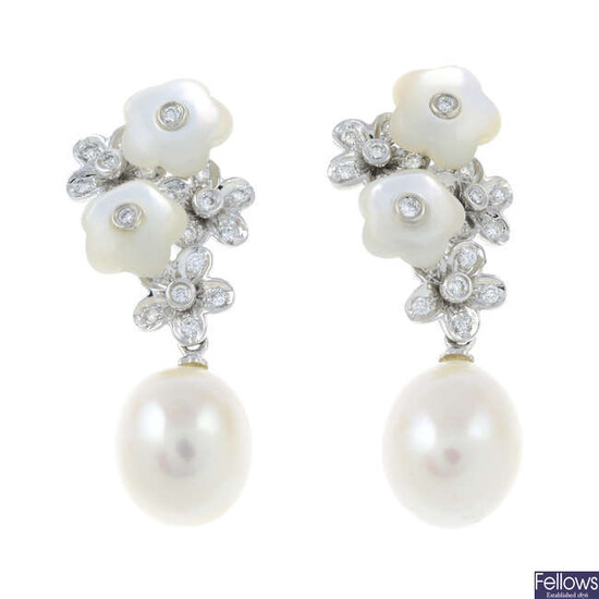 A pair of cultured pearl, diamond and mother of pearl drop earrings.