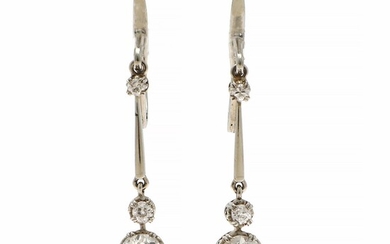 A pair of diamond ear pendants each set with a brilliant-cut and two old-cut diamonds weighing a total of app. 1.75 ct., mounted in 14k white gold. L. 3 cm. (2)
