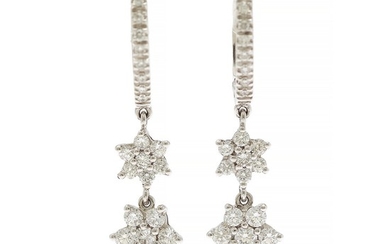 A pair of diamond ear pendants each set with numerous brilliant-cut diamonds totalling app. 1.43 ct., mounted in 18k white gold. L. app. 3.4 cm. (2)