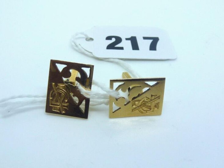 A pair of yellow metal cufflinks marked 14K, estimated...