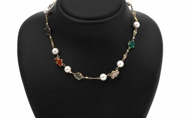 NOT SOLD. A pearl necklace set with numerous cultured pearls and fancy-cut quartz, a garnet and chalcedony, mounted in 18k gold. L. app. 43 cm. – Bruun Rasmussen Auctioneers of Fine Art