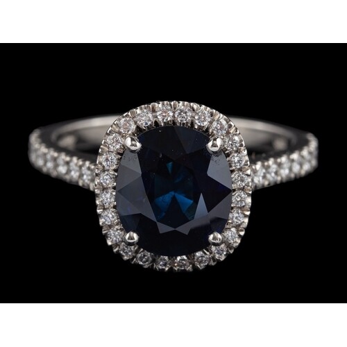 A platinum sapphire and diamond ring by Boodles & Dunthorne,...
