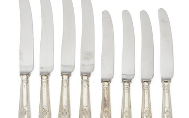A set of four each silver-handled dinner and dessert knives,...