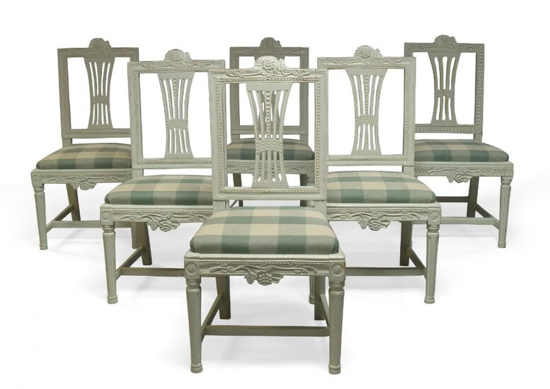 A set of six Gustavian white painted Lindome dining chairs,...