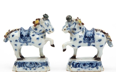 A small pair of Delft polychrome pottery horse figures