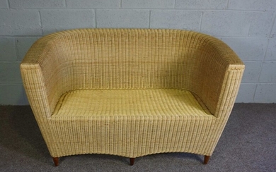 A two seat wicker framed settee, modern, 79cm high, 130cm wide
