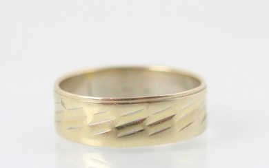 A white metal wedding band, the band with engraved detail, s...