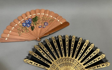 A wood fan, the monture carved and pierced, painted gold, c ...