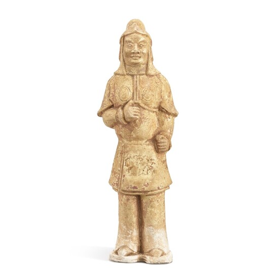 A straw-glazed standing figure of a warrior, Tang dynasty 唐 淡黃釉武士立俑, A straw-glazed standing figure of a warrior, Tang dynasty 唐 淡黃釉武士立俑