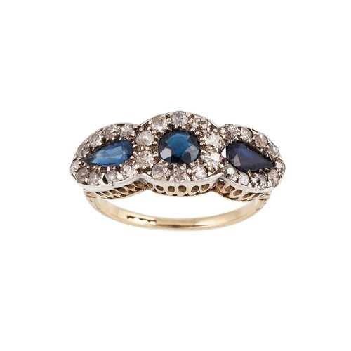AN ANTIQUE DIAMOND AND SAPPHIRE TRIPLE CLUSTER RING, mounted...