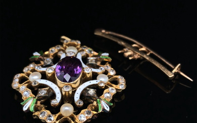 AN ANTIQUE SUFFRAGETTE PENDANT / BROOCH IN A FITTED CASE. THE PENDANT SET WITH AN OVAL CUT CENTRAL