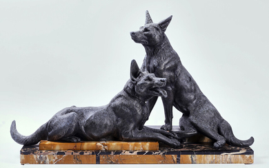 AN ART DECO SPELTER AND MARBLE MOUNTED SCULPTURE OF TWO GERMAN SHEPHERDS