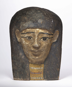 AN EGYPTIAN PAINTED WOOD COFFIN LID FRAGMENT, PTOLEMAIC PERIOD, CIRCA 1ST CENTURY B.C.