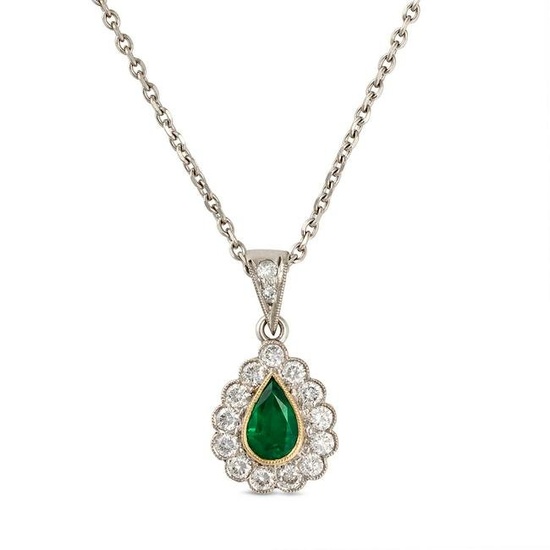 AN EMERALD AND DIAMOND PENDANT NECKLACE in 18ct white and yellow gold, the pendant set with a pear