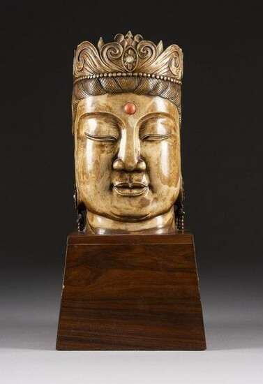 AN IVORY CARVED GUANYIN HEAD