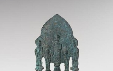 AN UNUSUAL TANG STYLE FOOTED BRONZE STELE