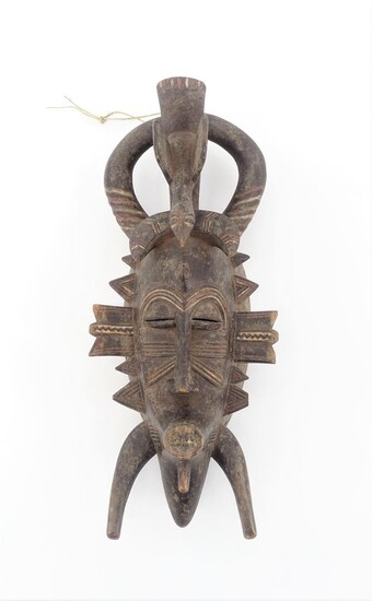 (-), Afrikaans houten kpelie-masker, Senufo, Ivoorkust, h. 38...