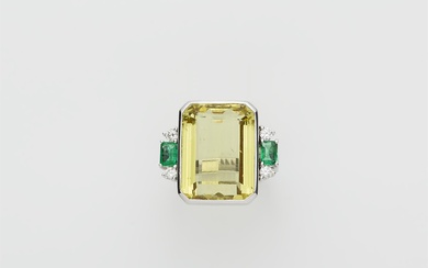 An 18k white gold diamond emerald and natural heliodor (lemon green beryl) ring.