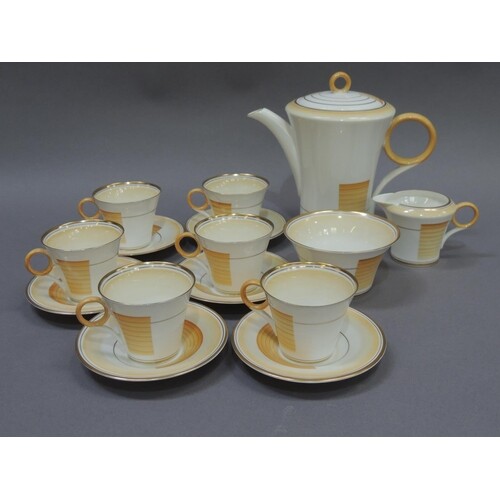 An Art Deco Shelley china coffee service, banded in amber on...