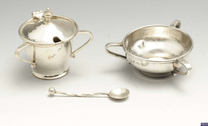An Arts & Crafts style silver open salt & mustard pot with spoon by Albert Edward Jones, etc.