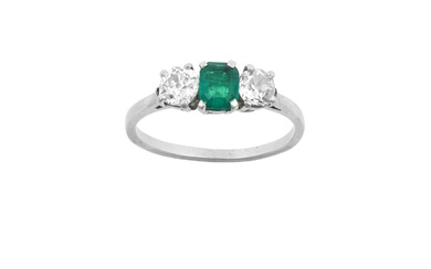 An Emerald and Diamond Three Stone Ring the emerald-cut emerald...