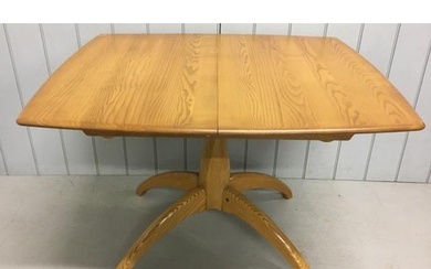 An Ercol Windsor, extending pedestal dining table. Extension...